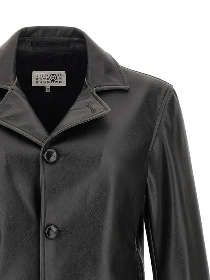 Jacket by MM6 Maison Margiela for men in polyester leather black & white showcases a contemporary silhouette, detailed with a contemporary and premium for a sophisticated finish.