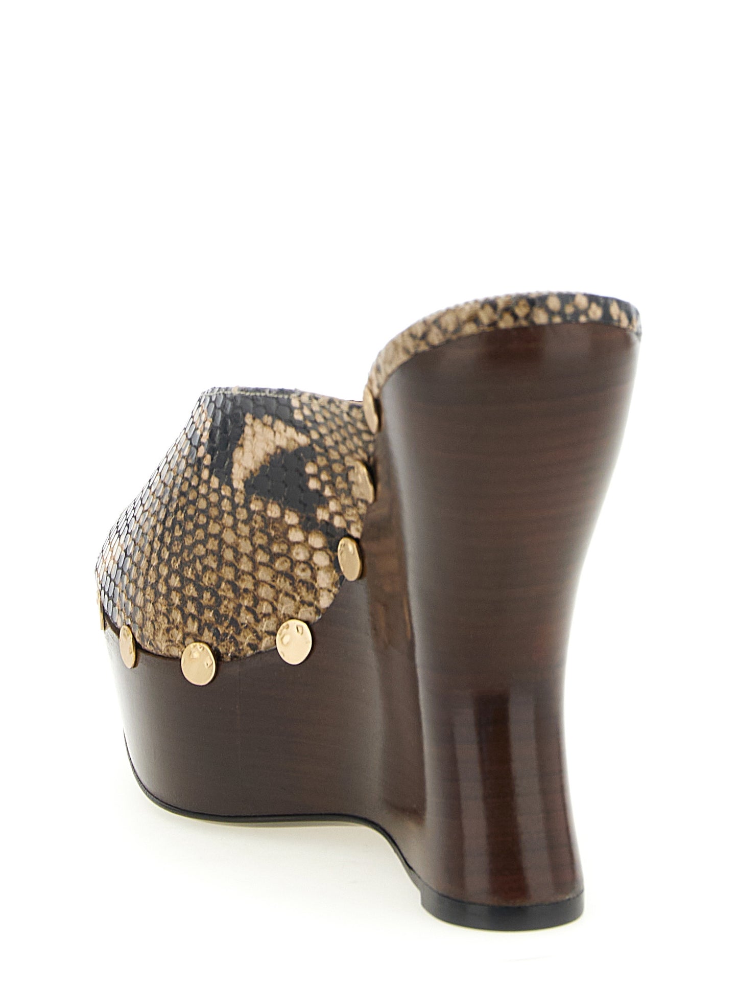 Wedge Mules Sandals by Magda Butrym for women in bos taurus calfskin python leather brown, gold, natural & print features an effortlessly chic silhouette from the Women's Bos Taurus Calfskin Python Leather Wedge Mules Sandals collection, showcasing a effortlessly chic wedge and elegant .