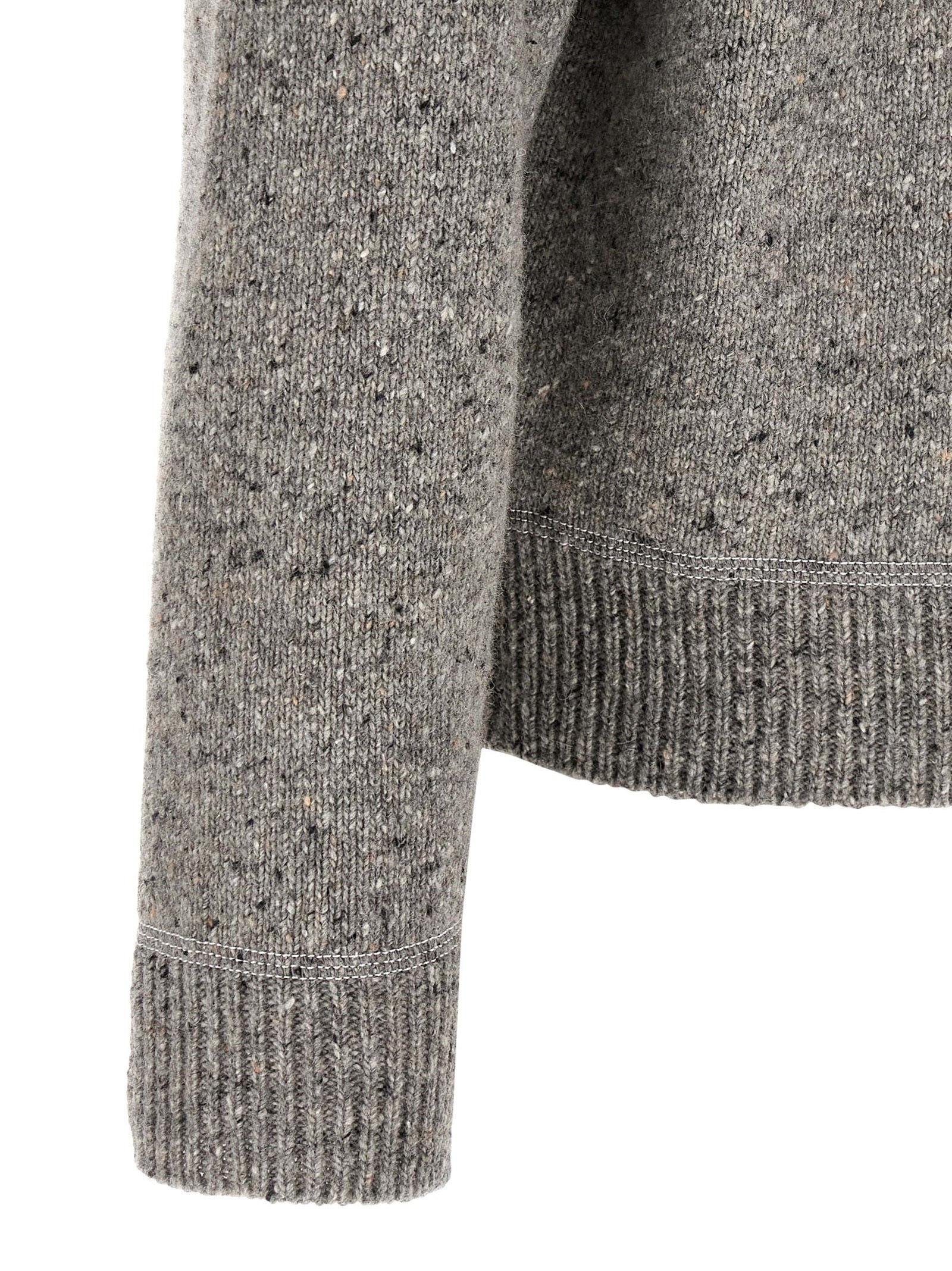 Cardigan by Dsquared² for men in polyamide wool gray features an impeccable silhouette, showcasing a sophisticated and detail for a truly impeccable finish.