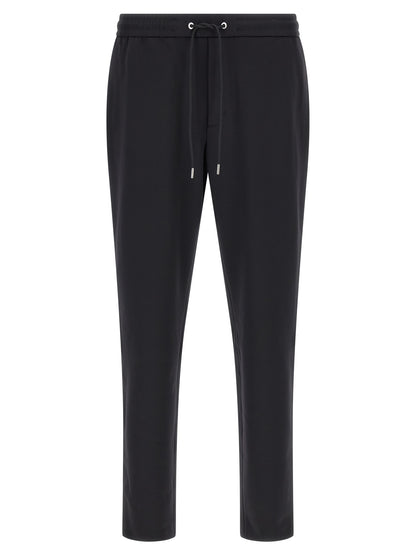 Joggers by Moncler for men in polyamide felt black features an sartorial tapered-leg and long with a cut for a sartorial finish.