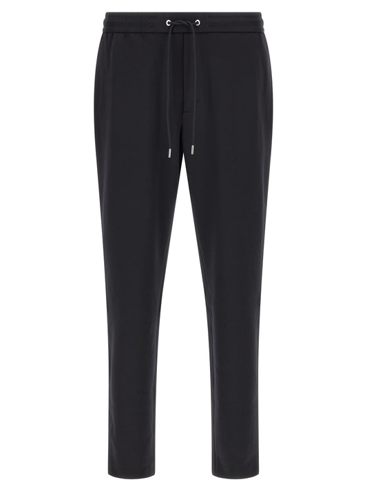 Joggers by Moncler for men in polyamide felt black features an sartorial tapered-leg and long with a cut for a sartorial finish.
