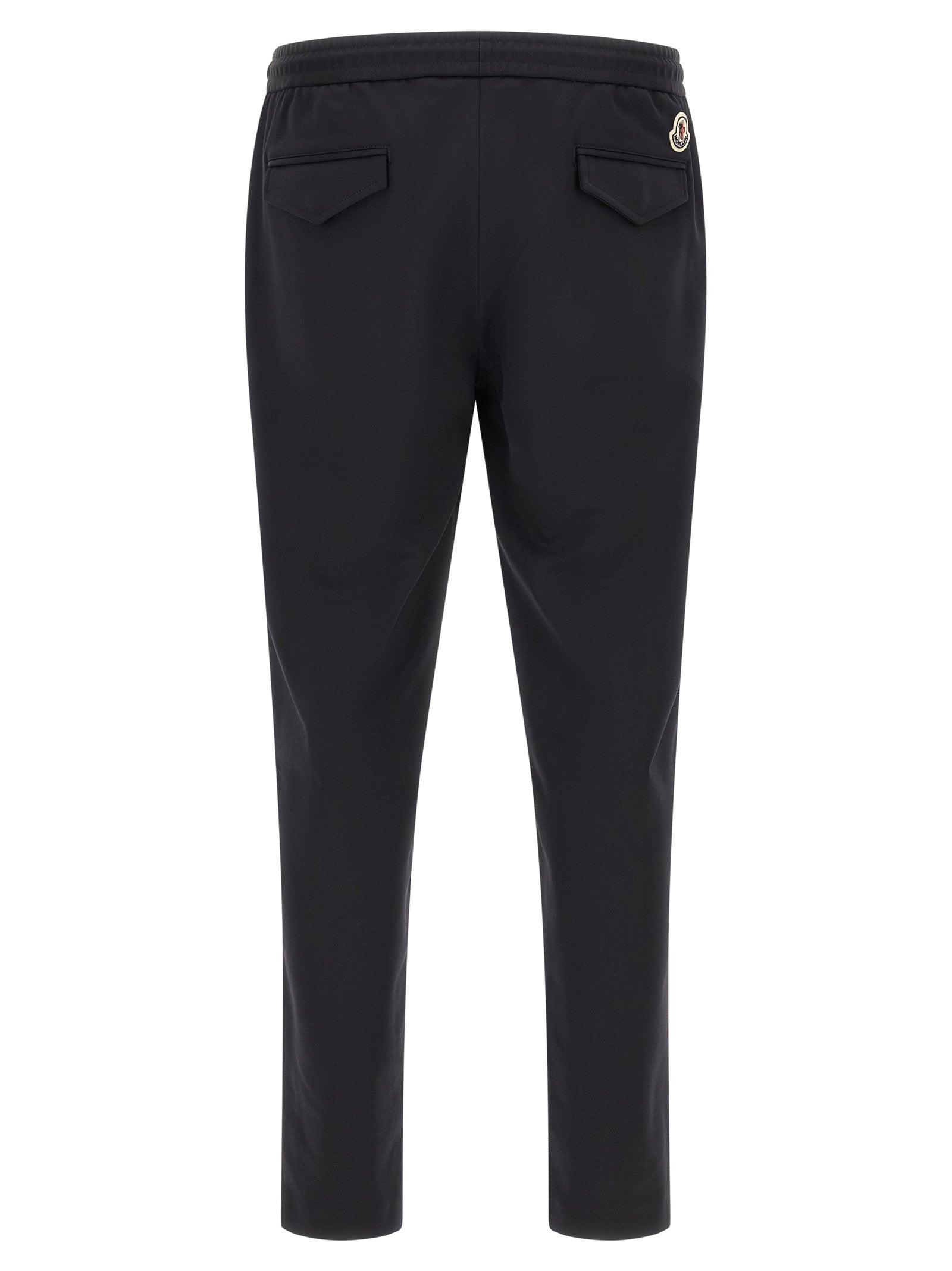 Joggers by Moncler for men in polyamide felt black features an sophisticated and tapered-leg with a precise long, creating a sophisticated and sophisticated silhouette.