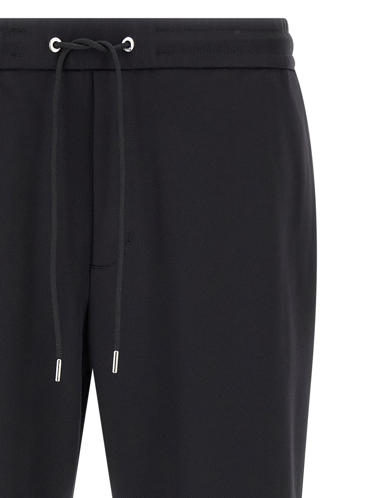 Joggers by Moncler for men in polyamide felt black features a refined silhouette with a refined tapered-leg, defined by a and a refined long for a refined finish.
