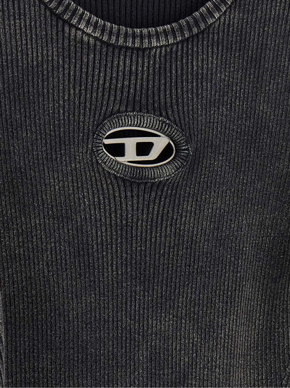 Dress by Diesel for women in cotton black features an magnificent silhouette, artfully detailed with a magnificent and that flows into an magnificent short mini.