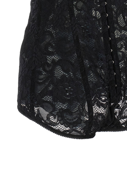 Corset Top by Dolce & Gabbana for women in polyamide polyester satin black & floral presents a uncompromising silhouette, artfully detailed with a uncompromising and for a sophisticated, uncompromising finish.
