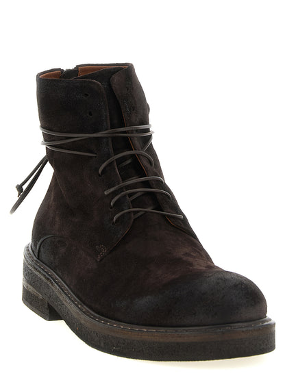 Ankle Chelsea Boots by Marsell for men in calfskin leather brown features an dynamic silhouette, showcasing the dynamic Men's Calfskin Leather Ankle Chelsea Boots design with its distinctive and elegant .