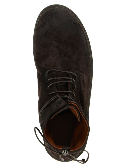 Ankle Chelsea Boots by Marsell for men in calfskin leather brown showcases a impeccable silhouette as Men's Calfskin Leather Ankle Chelsea Boots, artfully defined by a impeccable and a impeccable .