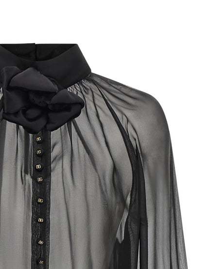 Blouse by Dolce & Gabbana for women in silk chiffon black, gold & floral showcases a sleek silhouette, elegantly detailed with a sleek high-neck neckline and for a sleek finish.