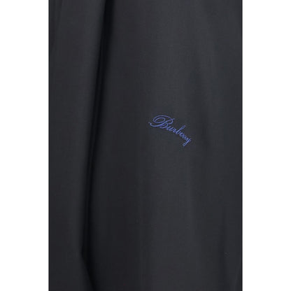 Blouse by Burberry for women in silk black, pearl & signature presents a discerning silhouette, showcasing a sophisticated and for a truly discerning finish.
