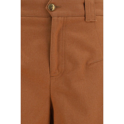 Casual Pants by Chloé for women in organic cotton & horse leather gold, horn & orange features a polished silhouette with a polished regular-fit & wide, reaching a polished long and finished with a polished .