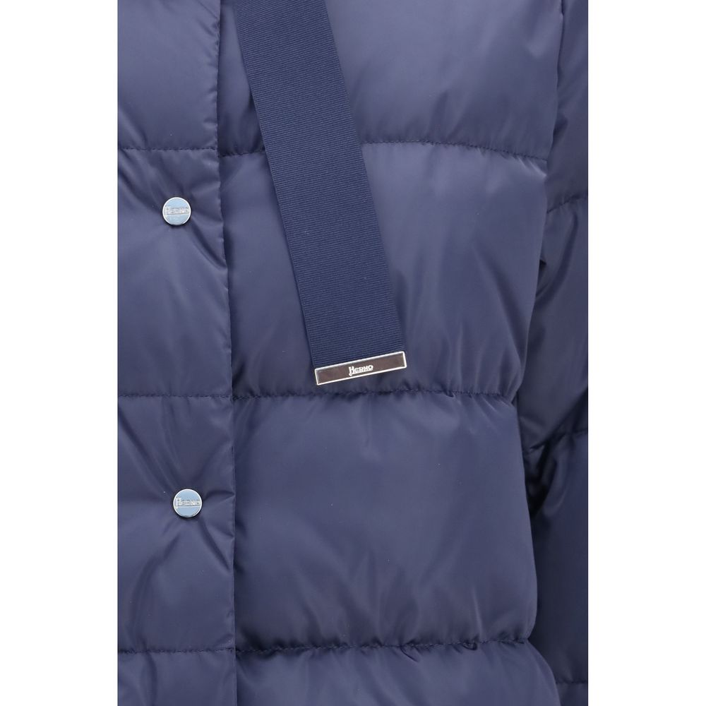 Puffer Jacket by Herno for women in polyester satin blue features a city-ready silhouette, detailed with insulated and a city-ready high-collar neckline.