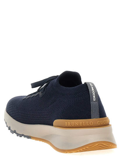 Athletic Sneakers by Brunello Cucinelli for men in wool blue showcases a architectural silhouette, artfully capturing the essence of the Men's Low Top Wool Athletic Sneakers with its signature architectural low-top style construction.