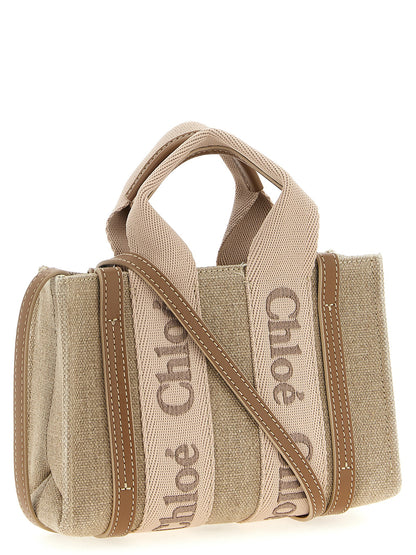 Mini Handbag by Chloé for women in cotton polyester canvas multicolor & pink features a signature silhouette, showcasing a secure and signature with versatile shoulder-strap, adjustable-strap & handle for a sophisticated look.