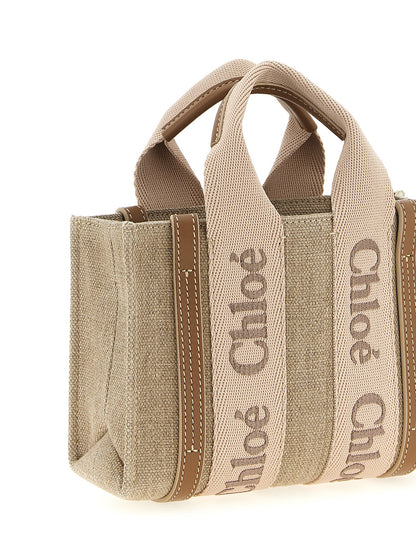 Mini Handbag by Chloé for women in cotton polyester canvas multicolor & pink features an refined silhouette, showcasing a secure , ample , and versatile shoulder-strap, adjustable-strap & handle for a sophisticated refined aesthetic.