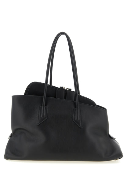 Medium Shoulder Bag by The Attico for women in calfskin leather black features an effortlessly chic silhouette with a secure zipper, ample external-pockets, and versatile shoulder-strap & handle for effortlessly chic everyday luxury.