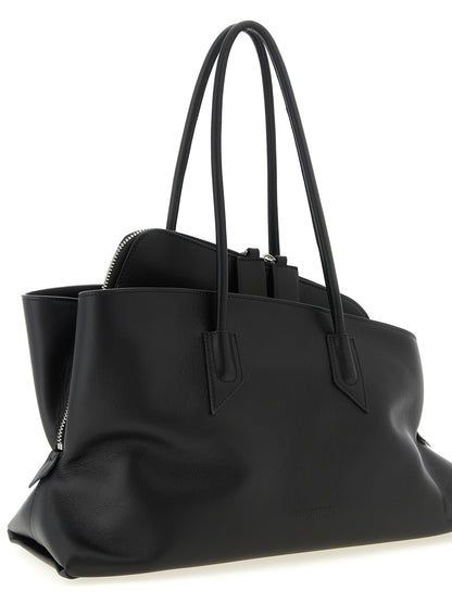 Medium Shoulder Bag by The Attico for women in calfskin leather black features a effortless chic silhouette with a secure zipper, ample external-pockets, and versatile shoulder-strap & handle for a effortless chic finish.