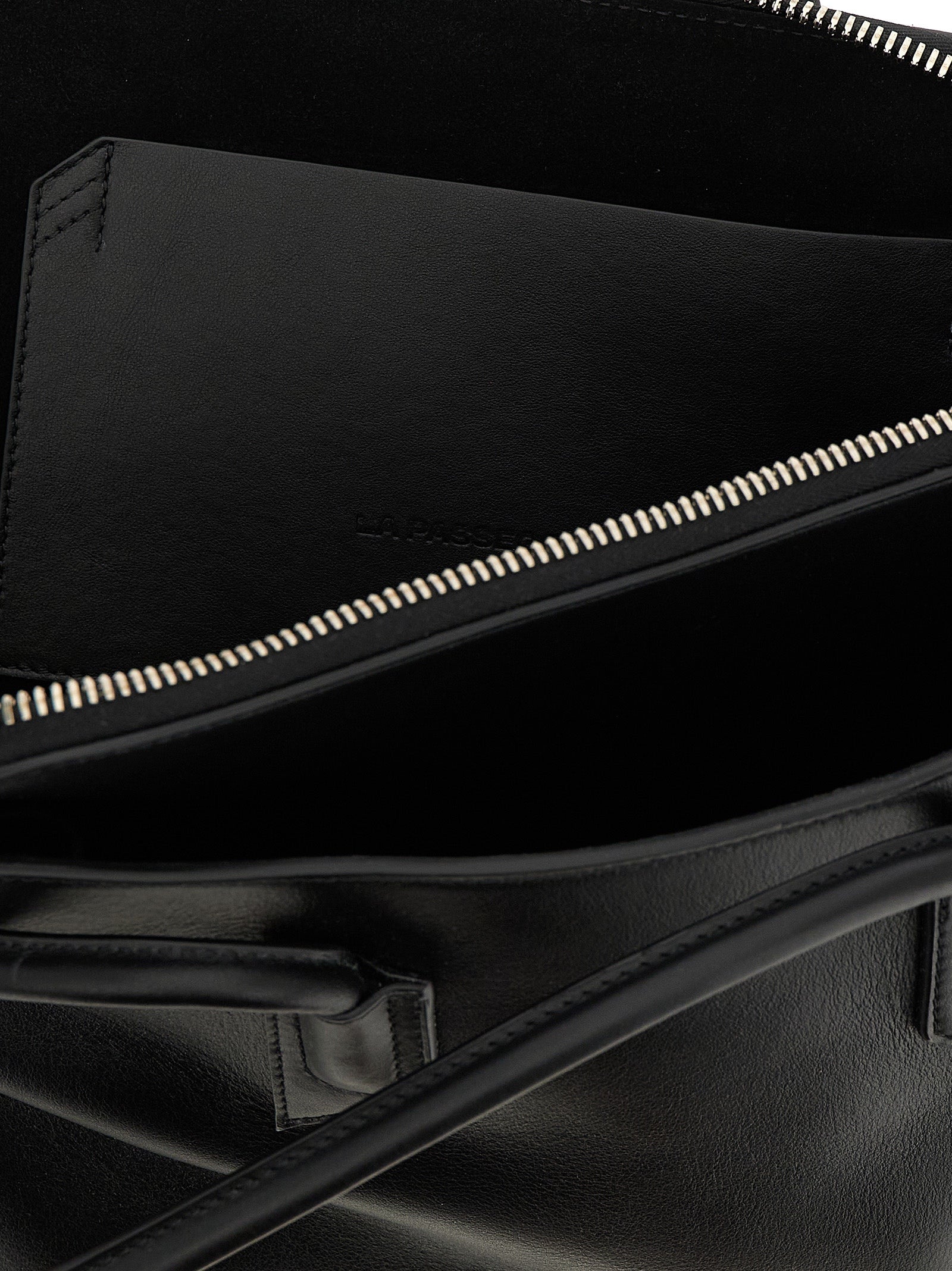 Medium Shoulder Bag by The Attico for women in calfskin leather black features a enviable silhouette, showcasing a secure zipper, ample external-pockets, and enviable shoulder-strap & handle for a enviable finish.
