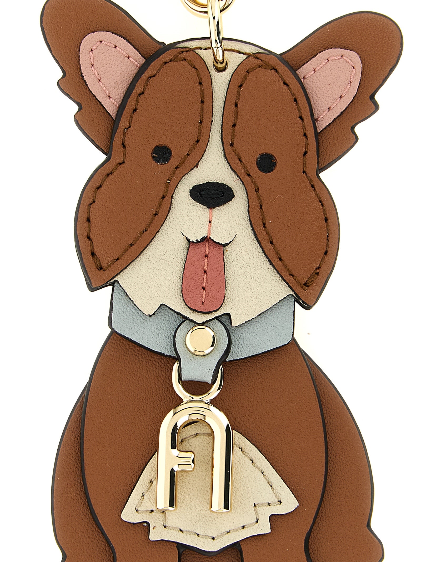 This Keychain by Furla for women in calfskin leather and blue, brown, cream & gold showcases a couture-inspired aesthetic, meticulously highlighting the and with a finish.