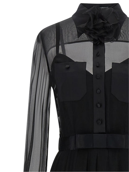 Dress by Dolce & Gabbana for women in silk polyester chiffon black, transparent & floral features an sultry silhouette defined by a and , falling to an sultry midi for a sultry look.