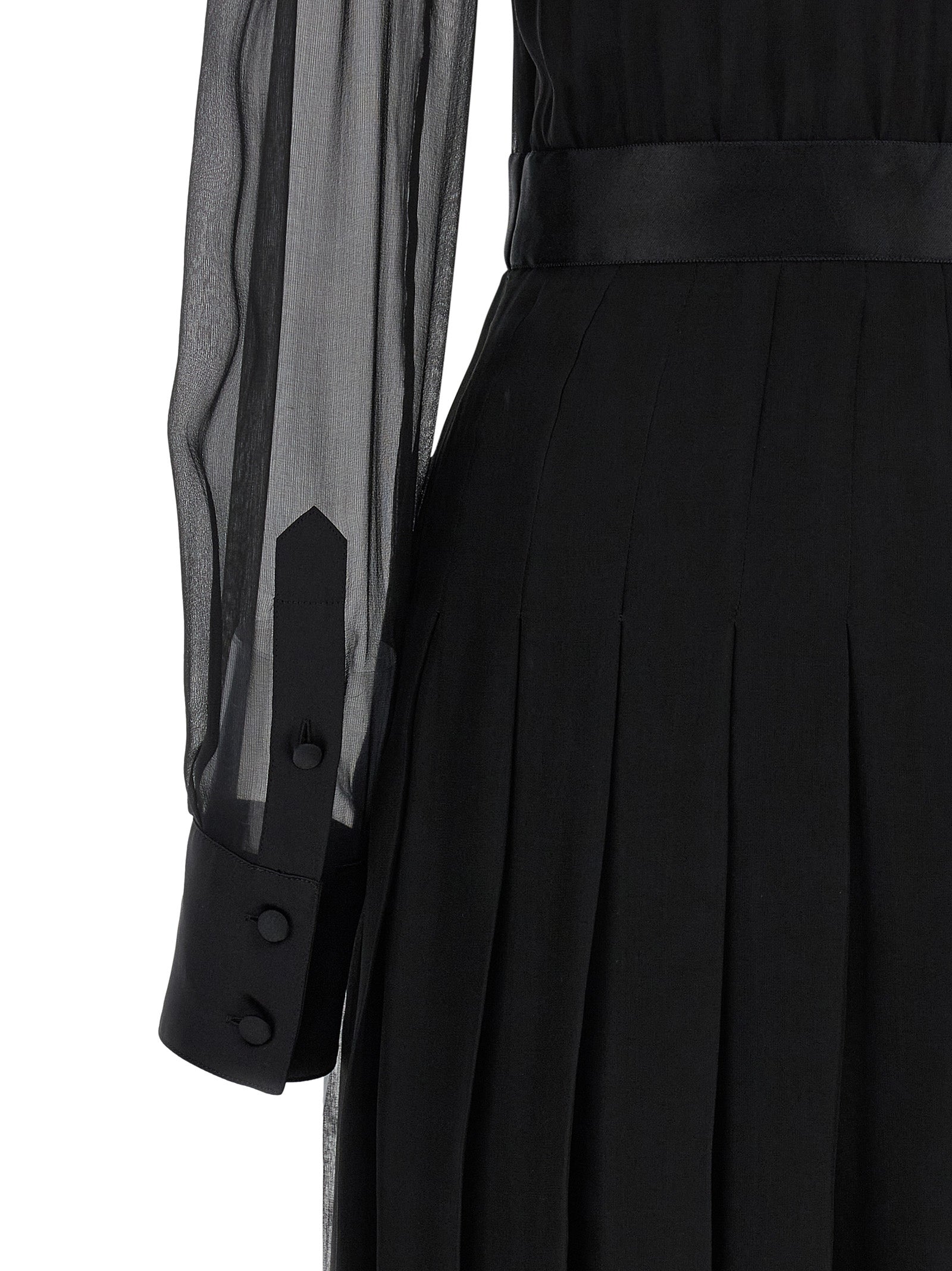 Dress by Dolce & Gabbana for women in silk polyester chiffon black, transparent & floral features a dramatic silhouette, showcasing an elegant and that flows into a dramatic midi.