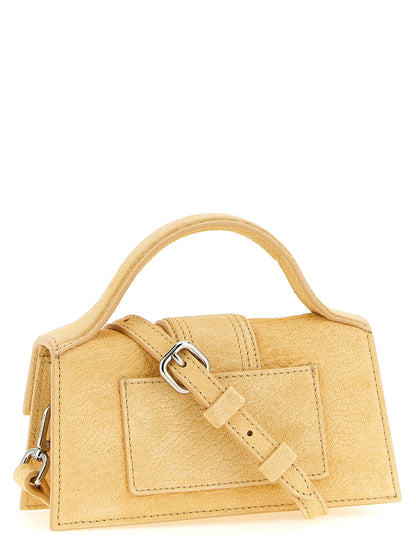 Handbag by Jacquemus for women in bos taurus suede cowhide leather bicolour, silver & yellow features an refined silhouette, showcasing a secure magnetic, ample , and versatile shoulder-strap, handle & adjustable-strap for a sophisticated refined aesthetic.