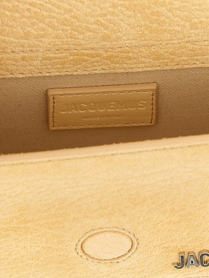Handbag by Jacquemus for women in bos taurus suede cowhide leather bicolour, silver & yellow features a exquisite silhouette, showcasing a secure magnetic and exquisite with versatile shoulder-strap, handle & adjustable-strap for a exquisite finish.