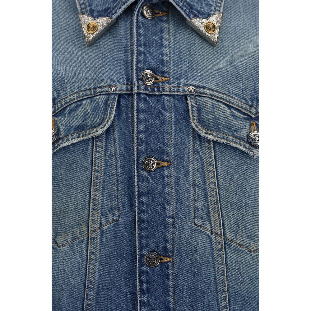 Trucker Jacket by Versace for men in denim cotton blue & signature features a dramatic silhouette, showcasing a sophisticated and distinctive pockets for a dramatic aesthetic.