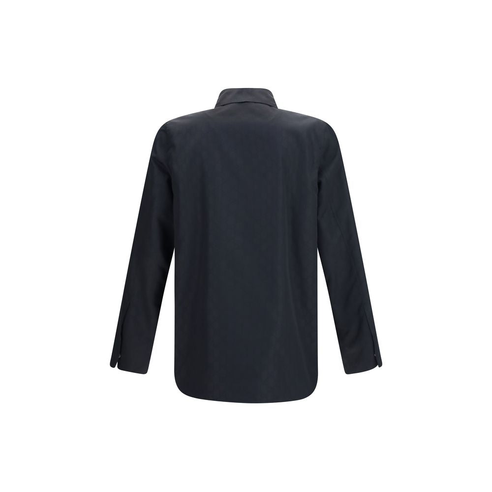 Overcoat by Gucci for men in polyamide & silk black showcases a architectural silhouette, artfully detailed with a distinctive and functional lightweight & pockets for a architectural finish.