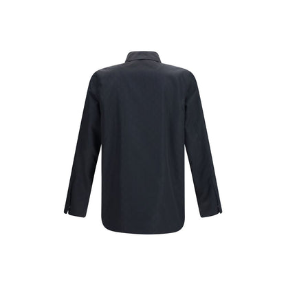 Overcoat by Gucci for men in polyamide & silk black showcases a architectural silhouette, artfully detailed with a distinctive and functional lightweight & pockets for a architectural finish.