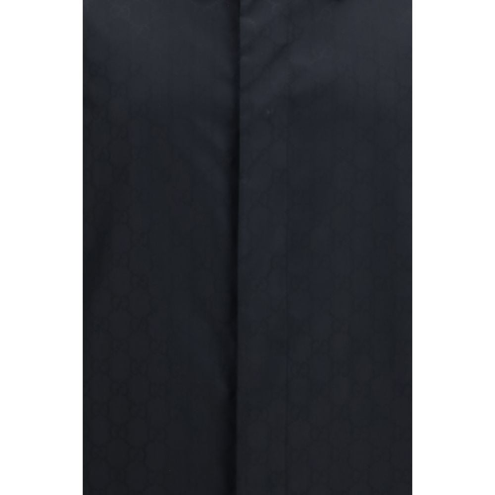 Overcoat by Gucci for men in polyamide & silk black features an voluminous silhouette, showcasing distinct lightweight & pockets and a voluminous for a truly voluminous aesthetic.