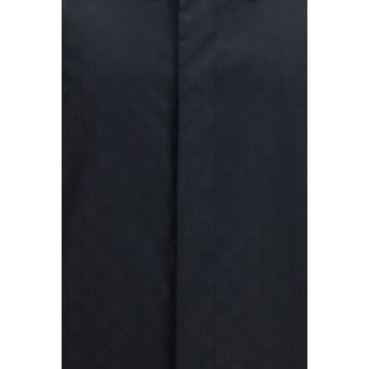 Overcoat by Gucci for men in polyamide & silk black features an voluminous silhouette, showcasing distinct lightweight & pockets and a voluminous for a truly voluminous aesthetic.