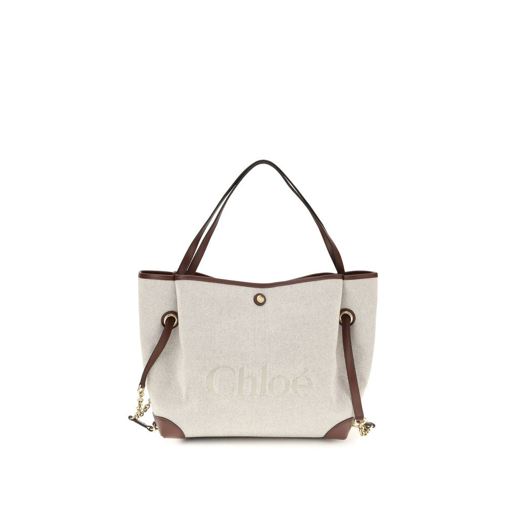 Bucket Tote Shoulder Bag by Chloé for women in cotton canvas & calf leather beige & gold showcases a enviable silhouette, artfully detailed with a secure , organized , and versatile for a enviable look.