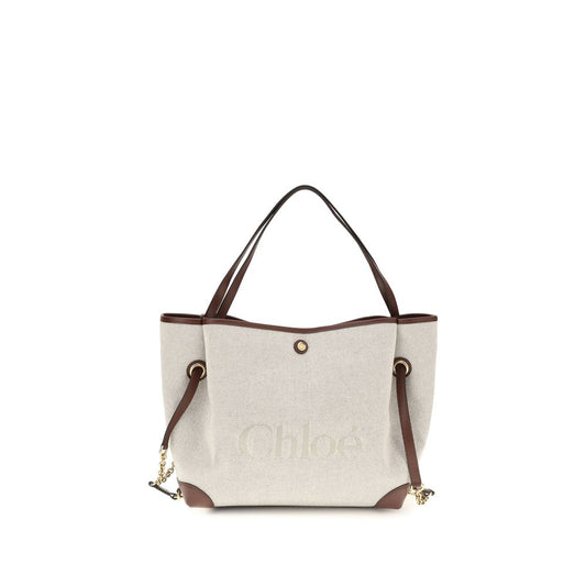 Bucket Tote Shoulder Bag by Chloé for women in cotton canvas & calf leather beige & gold showcases a enviable silhouette, artfully detailed with a secure , organized , and versatile for a enviable look.