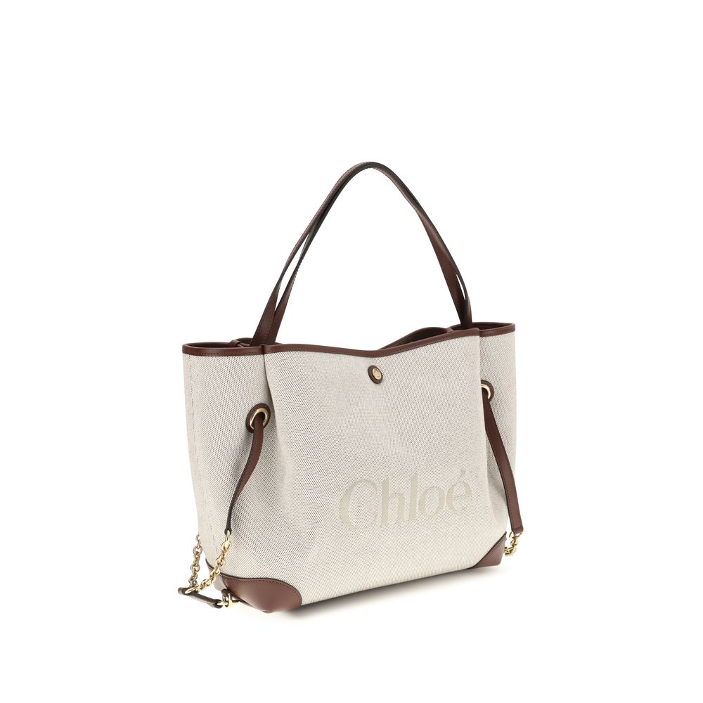 Bucket Tote Shoulder Bag by Chloé for women in cotton canvas & calf leather beige & gold features an effortlessly chic silhouette with a secure , ample , and versatile for effortlessly chic everyday luxury.