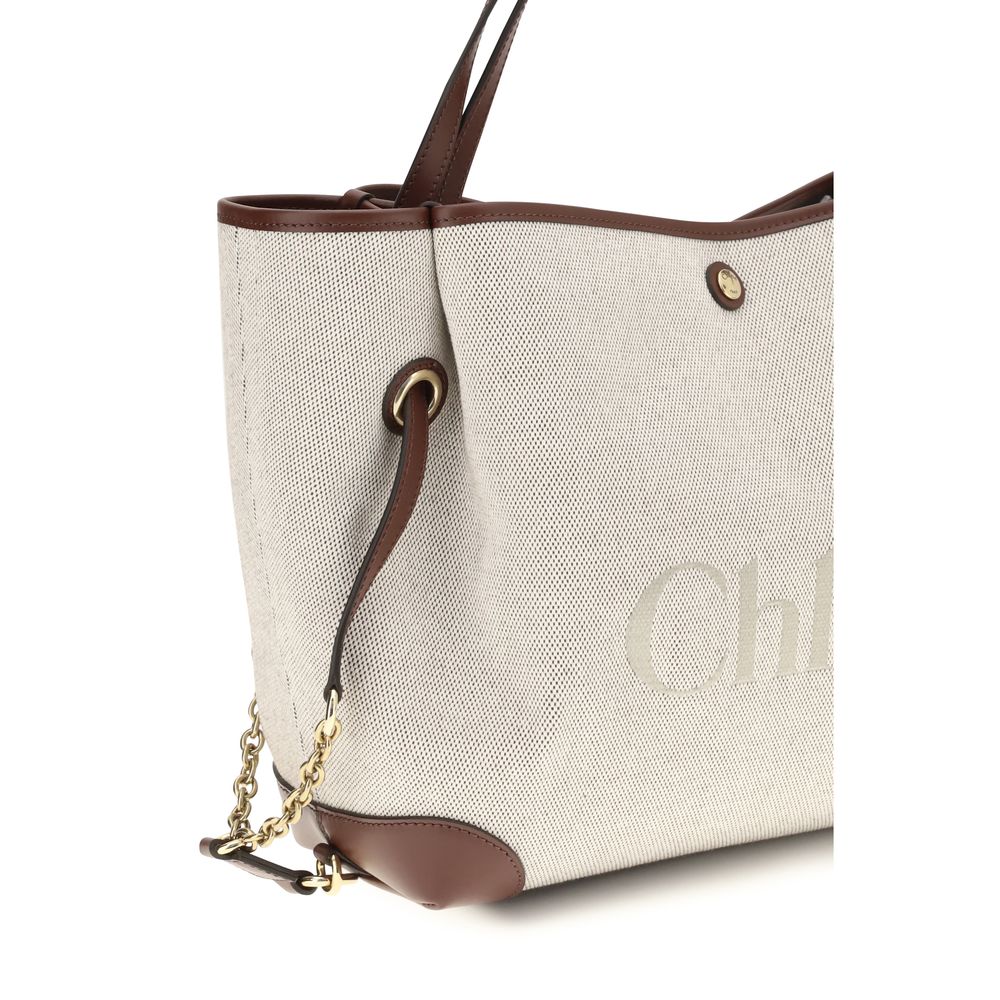 Bucket Tote Shoulder Bag by Chloé for women in cotton canvas & calf leather beige & gold presents a versatile silhouette, showcasing a secure and versatile with versatile for a sophisticated look.
