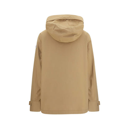 Hooded Vest by Moncler for women in polyamide beige & signature showcases a dynamic silhouette, perfectly balancing pockets, hooded, insulated & windproof with a dynamic hooded neckline for a sophisticated, high-fashion look.
