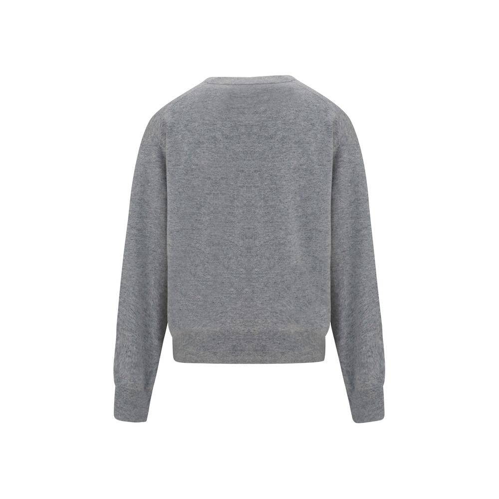 This Sweater by Brunello Cucinelli for women in cashmere & capra leather gray presents a understated silhouette, featuring a sophisticated v-neck neckline and for a understated finish.