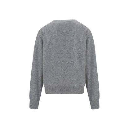 This Sweater by Brunello Cucinelli for women in cashmere & capra leather gray presents a understated silhouette, featuring a sophisticated v-neck neckline and for a understated finish.