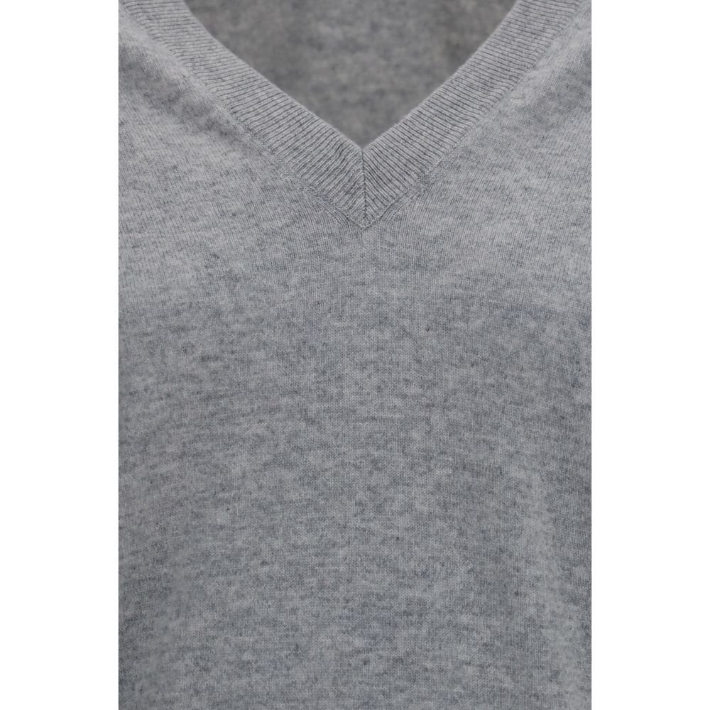 Sweater by Brunello Cucinelli for women in cashmere & capra leather gray showcases a discreet silhouette, finished with a discreet and for a discreet look.