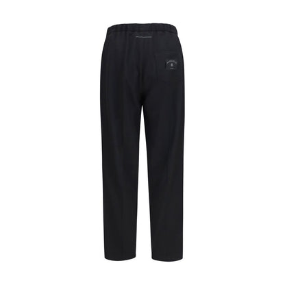 Casual Pants by MM6 for men in merino wool & polyester black presents a refined pantology silhouette, artfully defined by a refined pantology straight-leg & regular-fit, long, and a sophisticated .