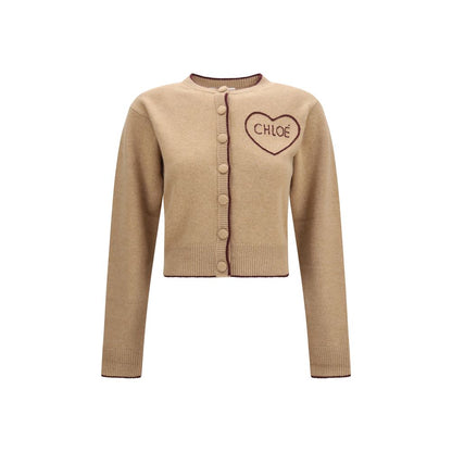 Cardigan by Chloé for women in cashmere merino wool & capra leather beige showcases a luxurious silhouette, meticulously detailed with a sophisticated and for a refined finish.