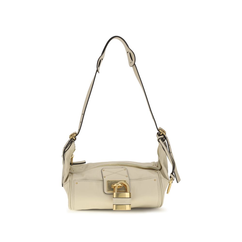Small Shoulder Bag by Chloé for women in bos taurus calf leather beige & signature features a effortless chic silhouette with a secure zipper & buckle, ample , and versatile shoulder-strap for a effortless chic finish.