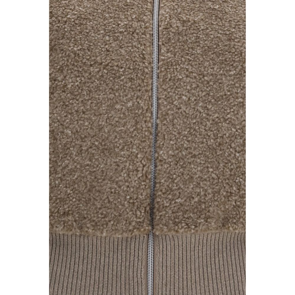 Cardigan by Herno for women in merino wool beige showcases a captivating silhouette, artfully detailed with a captivating and for a truly sophisticated captivating look.