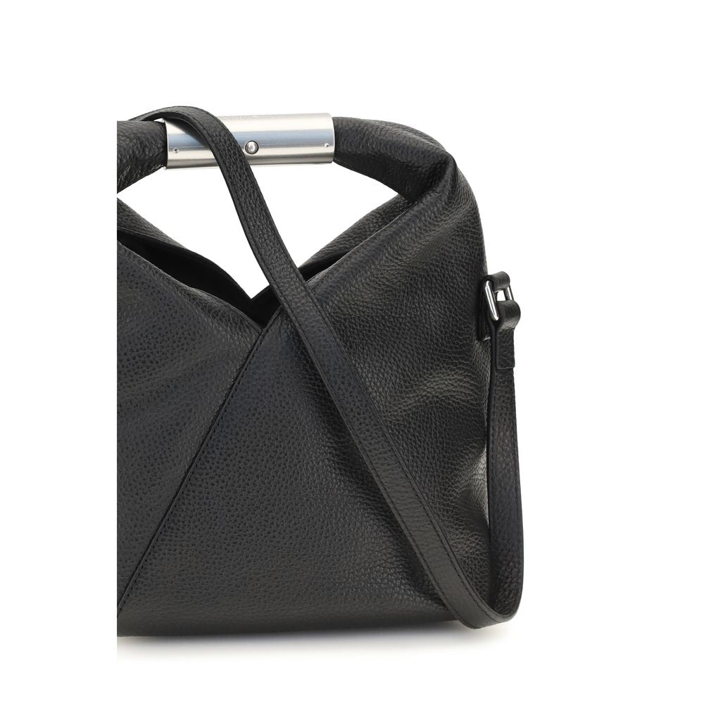 Mini Shoulder Bag by MM6 for women in grained bos taurus calf leather black, white & signature features a enviable silhouette, showcasing a secure magnetic, ample , and enviable shoulder-strap, adjustable-strap & handle for a enviable finish.