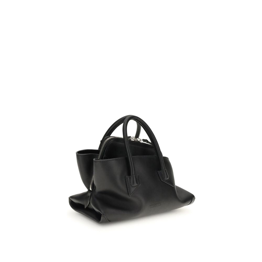 This Mini Handbag by The Attico for women in bos taurus calf suede leather and black & signature presents a sculptural silhouette featuring a secure zipper, ample , and versatile handle for a sculptural finish.