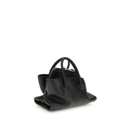 This Mini Handbag by The Attico for women in bos taurus calf suede leather and black & signature presents a sculptural silhouette featuring a secure zipper, ample , and versatile handle for a sculptural finish.
