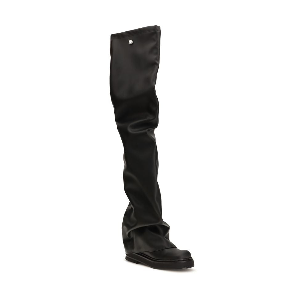Platform Long Over-The-Knee Boots by The Attico for women in polyester polyurethane tu leather black features an avant-garde Women's Polyester Polyurethane TU Leather Platform Long Over-The-Knee Boots silhouette, defined by a sophisticated platform and a avant-garde square toe style.