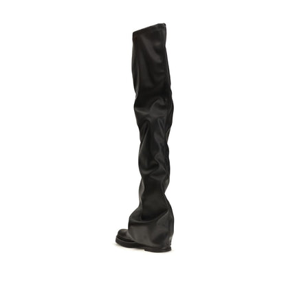 Platform Long Over-The-Knee Boots by The Attico for women in polyester polyurethane tu leather black showcases a ergonomic silhouette from the Women's Polyester Polyurethane TU Leather Platform Long Over-The-Knee Boots collection, featuring a ergonomic platform and a ergonomic square toe style.