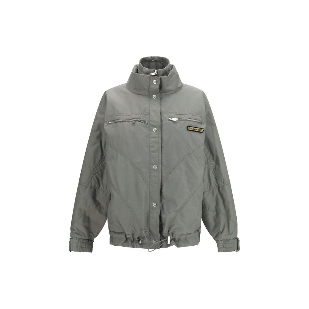 Bomber Jacket by The Attico for women in polyurethane polyamide & cotton gray showcases a bohemian silhouette, artfully detailed with a bohemian high-collar neckline and signature pockets & insulated for a truly bohemian finish.