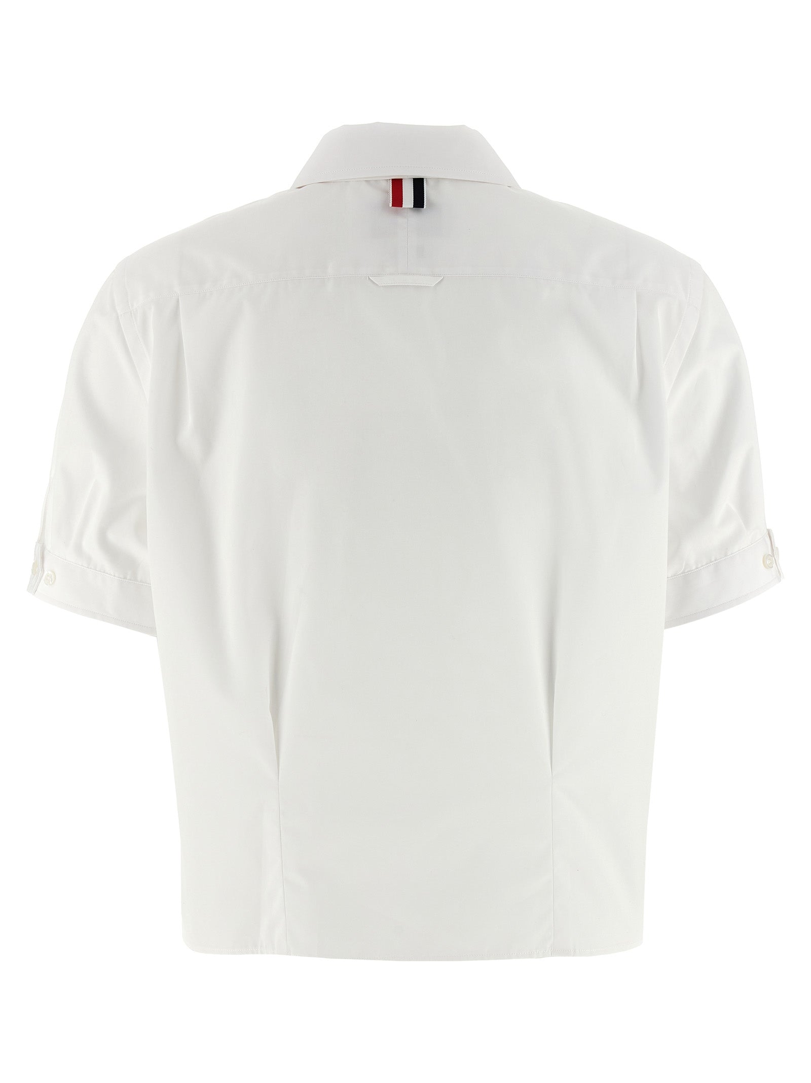 Blouse by Thom Browne for women in cotton white showcases a sleek silhouette, elegantly detailed with a sleek and for a sleek finish.